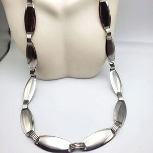 Metallic silver tone robotic century necklace‎